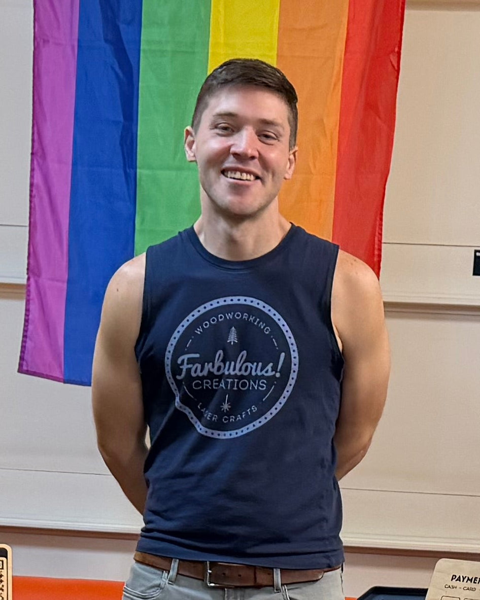 Ron from Farbulous Creations standing behind his market table.
