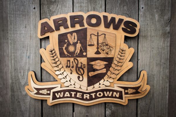 Expanded, full-width view of wooden Watertown Arrows Emblem